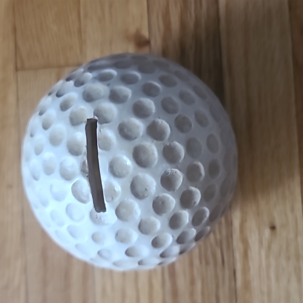 Golf ball piggy bank